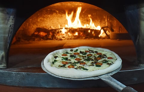 Wood-fired pizza from Crumbled Cheese