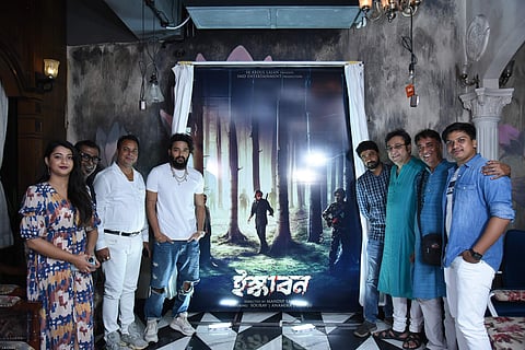 The cast of Iskabon stands in front of the lifesize poster that was unveiled at the venue