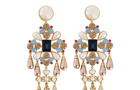 Shoulder grazing statement earrings are back