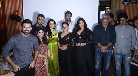 Team FIR pause for a frame at the trailer launch of Joydeep Mukherjee’s film FIR