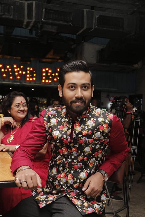 Rohit Banerjee added a layer of prints to his red ensemble and we loved the freshness