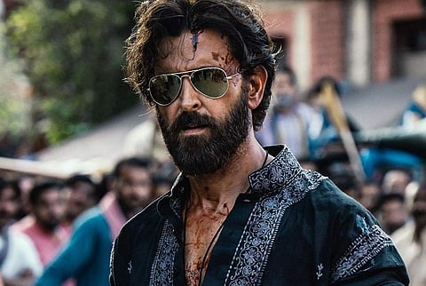 Covered in blood, Hrithik Roshan is seen sporting a rugged yet intense look as he sports a heavy beard and moustache in the first look of Vikram Vedha.