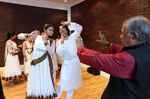 Kamal Haasan posted this picture of Maharaj ji training him and actress Andrea for 'Unnai Kaanaadhu...', the famous song from 'Vishwaroopam'
