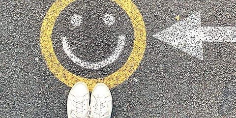 What is the power that a simple act of smiling holds?