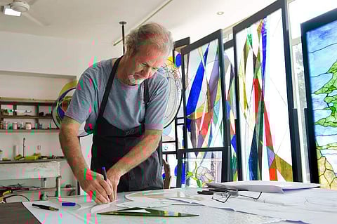 Robert L’Heureux at his workshop in Auroville