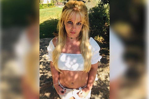 Britney said that dancing in front of the camera for social media is her way of battling the pain