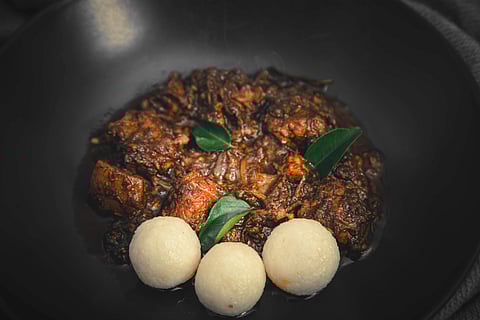 Pandhi curry with rice balls