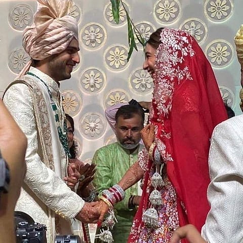 Amol Ambani and Khrisha Shah at the wedding altar
