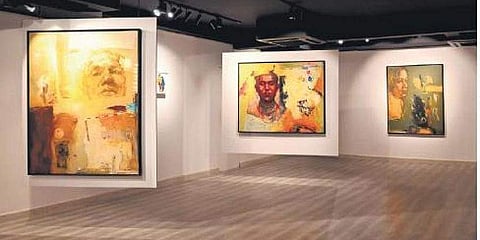 A few mixed media paintings on canvas from the portrait series showcased at Usha Phenany Pathak’s solo exhibition ‘Gold Mines’