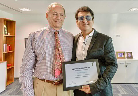 Nadiadwala (left) receives his award from Michael Garin, CEO, twofour54 Abu Dhabi