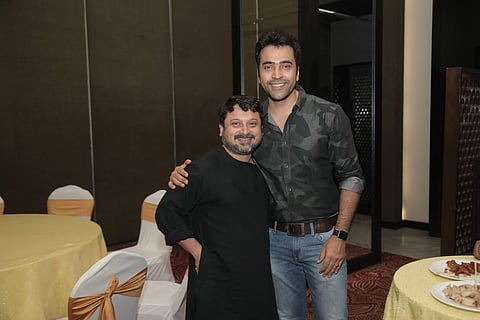 Director Shiboprosad Mukherjee poses with actor Abir Chatterjee