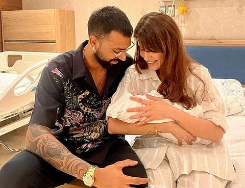 Krunal Pandya with his wife, Pankhuri Sharma and his newborn baby boy