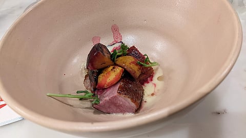 Duck breast with charred stone fruits