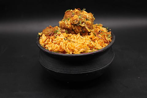 Arcot kozhi biryani made with Thooyamalli rice from Tamil Nadu