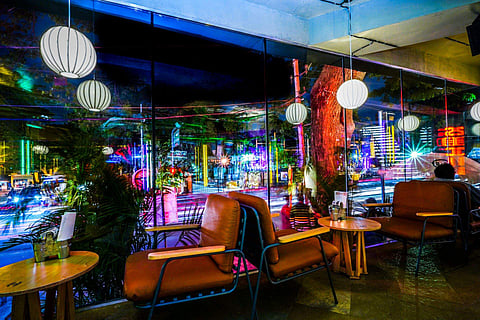 New BEL Road Social boasts a first-of-its-kind NFT gallery and a menu featuring the chain’s classics