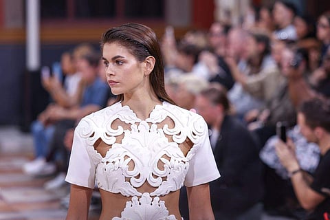 Kaia Gerber wears a creation for the Valentino Spring/Summer 2024 womenswear fashion collection