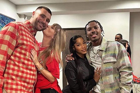 Taylor hangs out with Kelce, his teammate and girlfriend