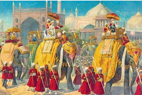 Art curators Swapna Liddle and Rana Safvi stand beside a silver albumen print on paper of Chandni Chowk by Samuel Bourne, circa 1860.