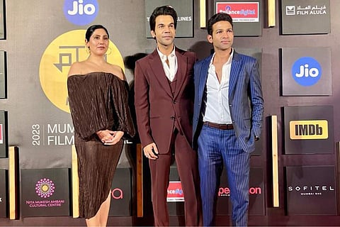 Rita and Vinod with Rajkummar Rao (centre)