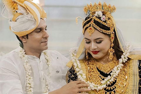 In frame:  Randeep Hooda and Lin Laishram