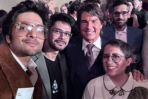 Ali Fazal with Tom Cruise and Guneet Monga