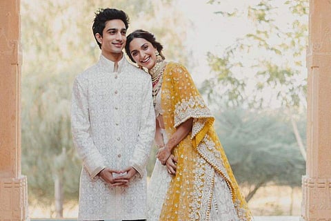 Kiara Advani stuns in yellow as she poses with brother Mishaal in new wedding pictures