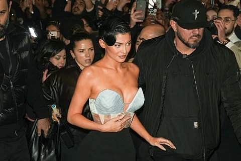 Kylie Jenner in a black midi skirt