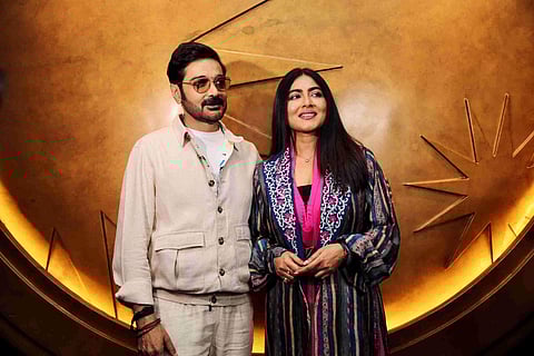 The leads Prosenjit and Gargee pose for the paparazzi