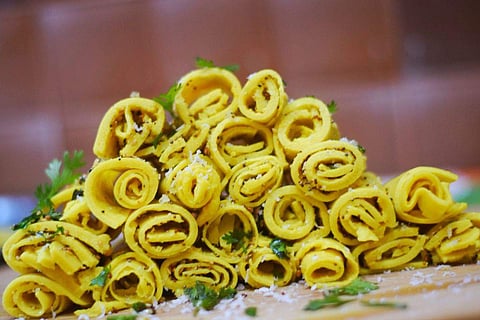 Khandvi is a melt-in-your-mouth snack goes perfectly with a cup of tea