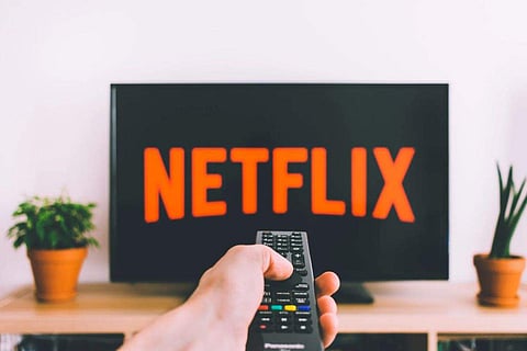 Netflix warned that it might tighten its password-sharing policies to raise income and subscriptions