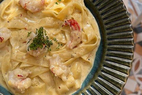 Seafood Fettuccine in Truffle and Saffron infused Cheese