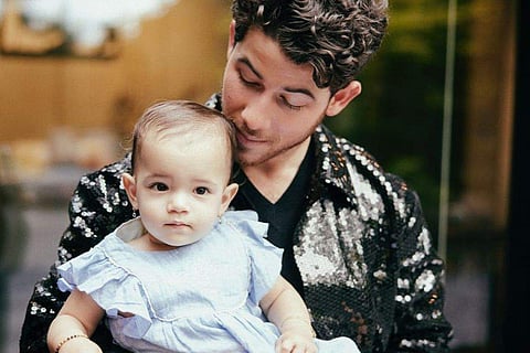 Nick Jonas with Malti Marie