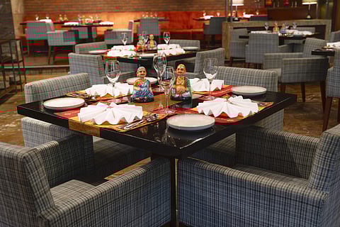 Handmade thalaiyatti bommaigal (dolls) from Thanjavur take centrestage at each table