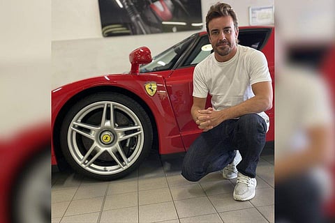 Fernando Alonso with his Ferrari Enzo