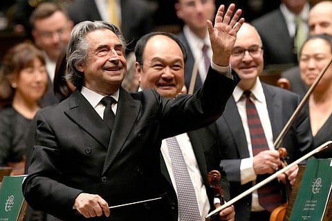 Riccardo Muti, musical director of the Chicago Symphony Orchestra waves goodbye to the audience