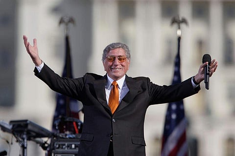 Tony Bennett reacts to the crowd during his performance at comedians Jon Stewart's and Stephen Colbert's Rally to Restore Sanity in 2010