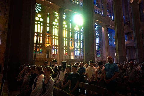 Worshippers attend a Mass in the Sagrada Familia basilica in Barcelona