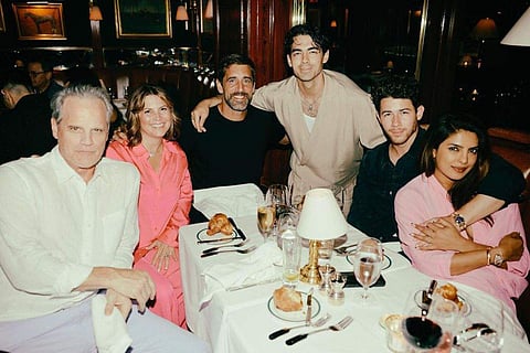 Priyanka Chopra and Nick Jonas with Joe Jonas and family