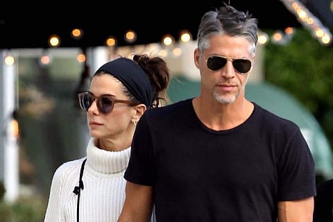 Bryan Randall and Sandra Bullock