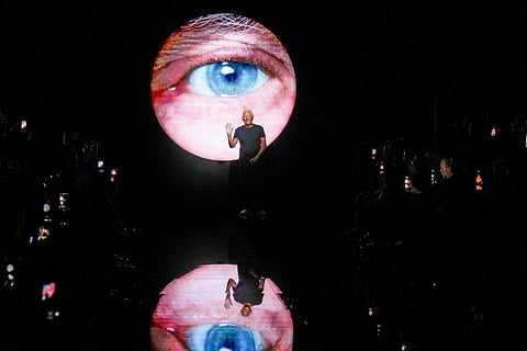 Designer Giorgio Armani accepts applause after the conclusion of his men's Fall-Winter 2024-2025 collection