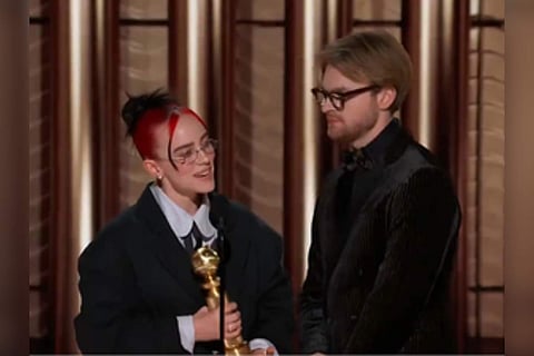 Billie Eilish and Finneas with the Golden Globe