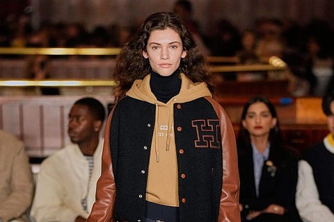 In frame: Model wearing a piece from Tommy Hilfiger Fall 2024 collection