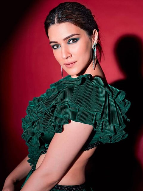 Green outfits you should wear to twin with the Christmas tree