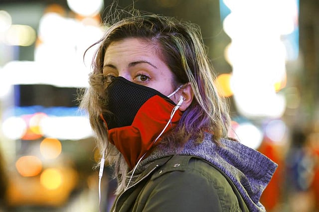 <em>A Brooklyn resident at Times Square (AP Photo/Kathy Willens)</em>