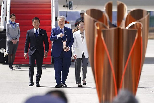 <em>The Flame Arrival Ceremony (AP Photo/Eugene Hoshiko)</em>