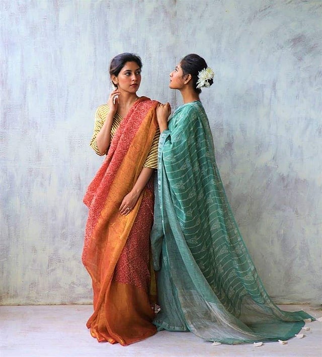 Handwoven linen light as air, with minimal zari details, in pastel colours