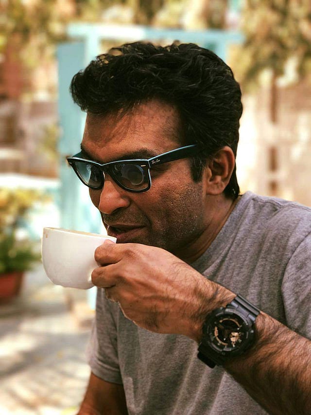 <em>Vijay Menon</em>