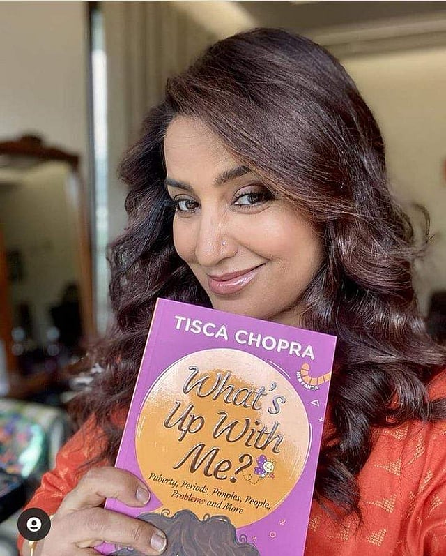 Tisca Chopra with a copy of her book