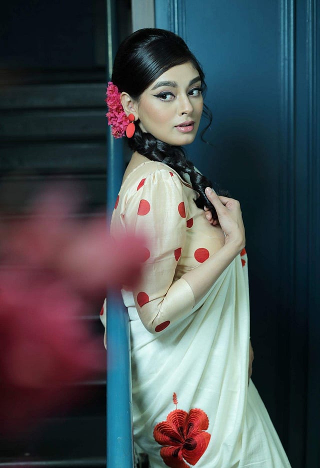 <em>A simple cotton floral sari and polka-dotted puff sleeve blouse by Parama Ghosh</em>