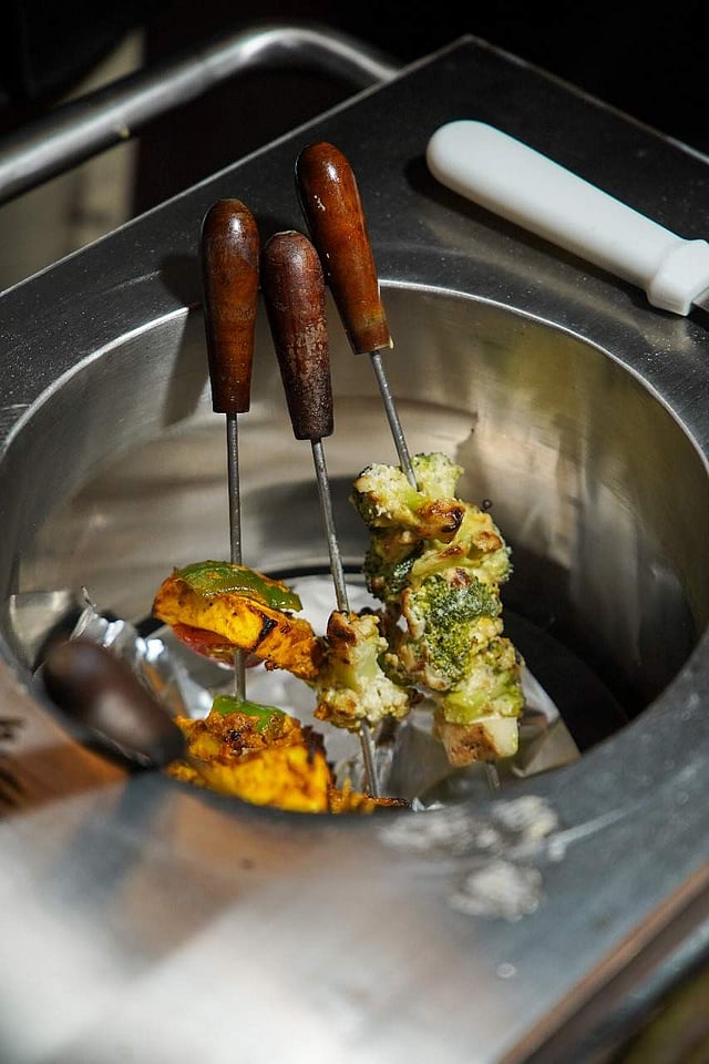 Kebabs in a live tandoor